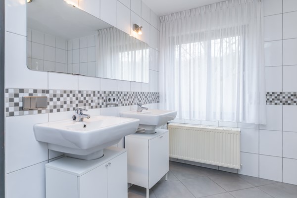 Foto - Te koop: Dr. Calsstraat 48 Landgraaf Instapklare uitstekend onderhouden geschakelde 2 kap woning in Schaesberg